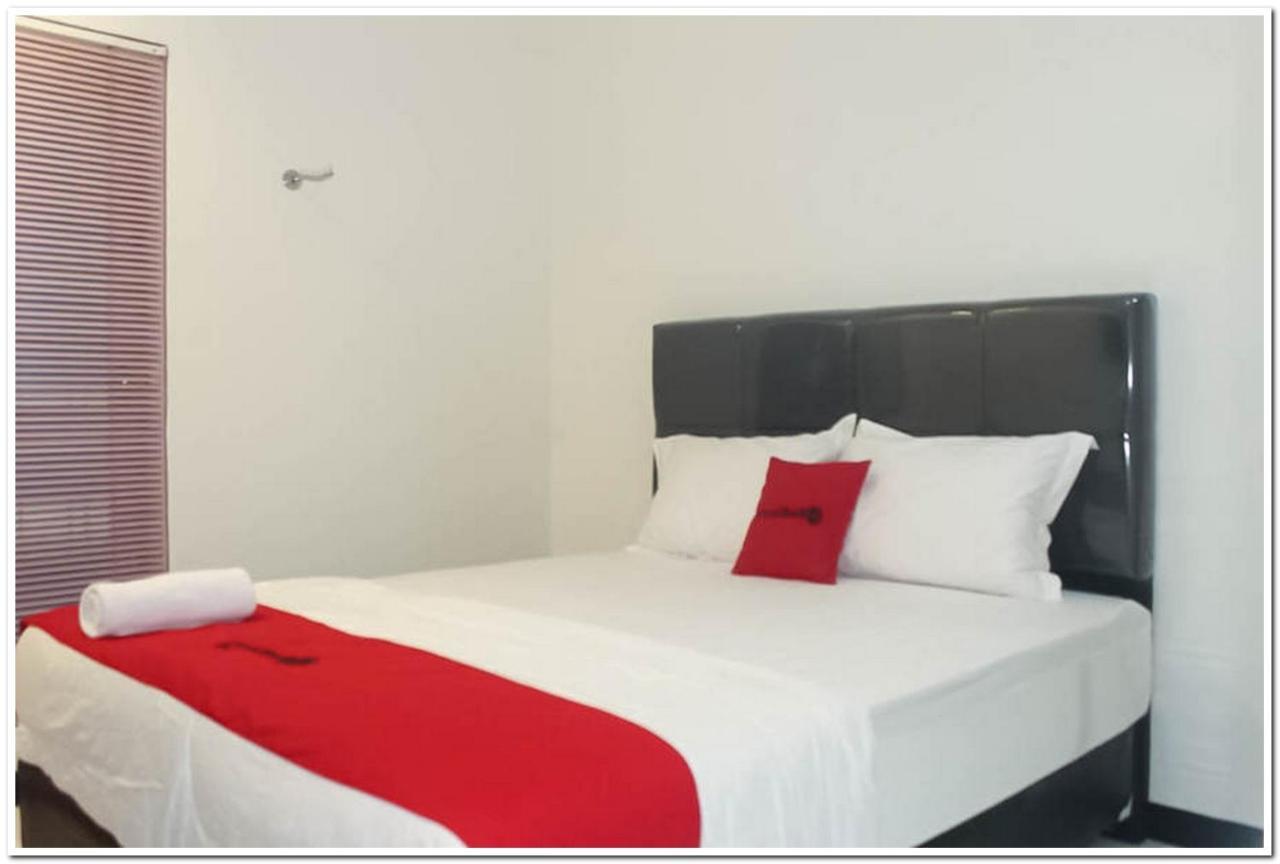 Reddoorz @ Paus Raya Hotel Палангкарая Екстериор снимка